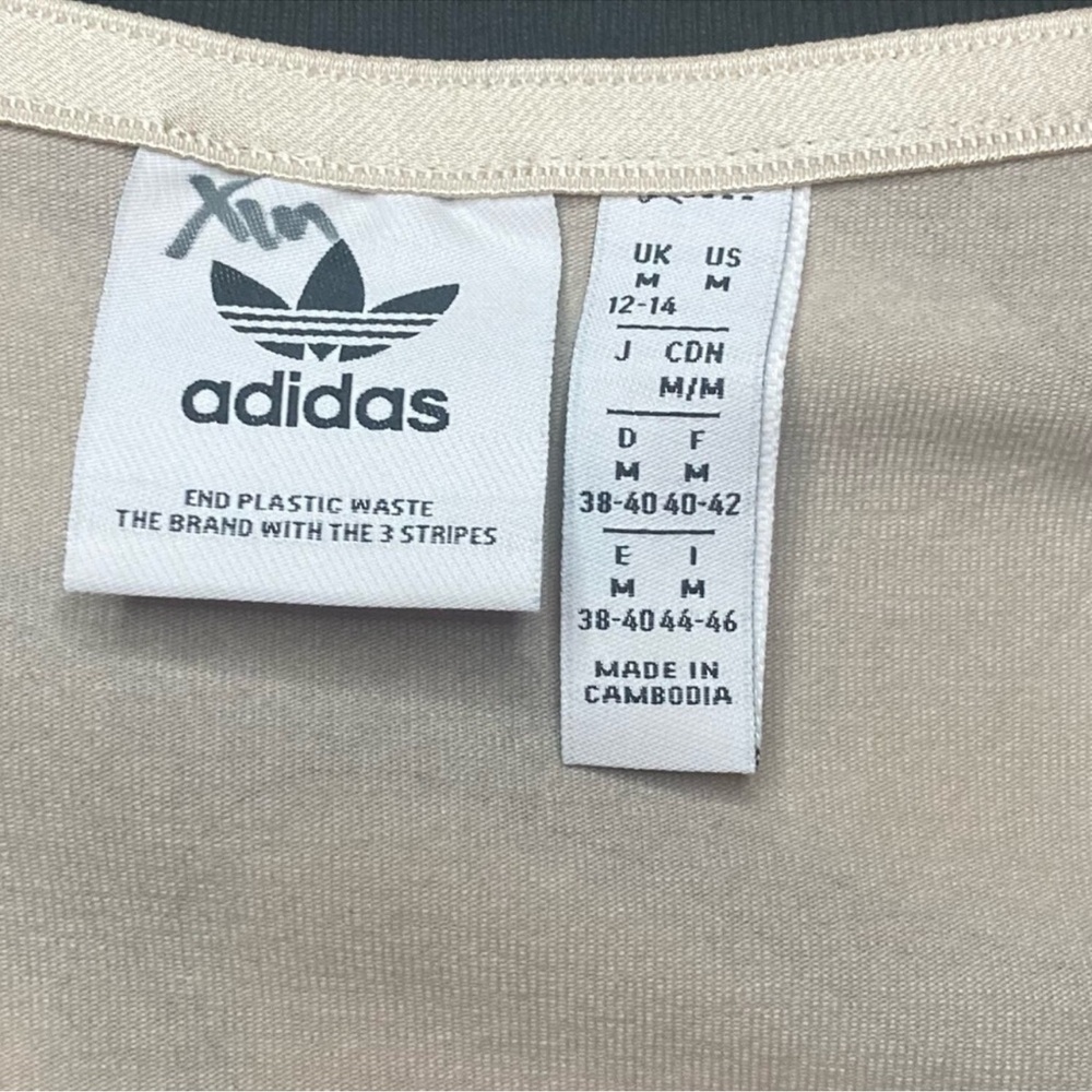 Adidas X Marimekko Graphic Midi Tee
Dress Size Medium Black Tan Limited Edition - Picture 11 of 13